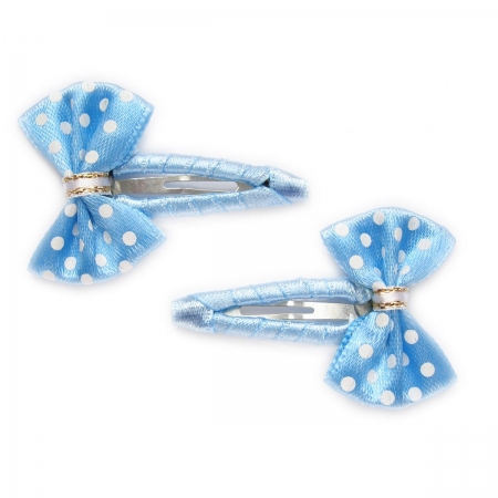 Pair of blue hair clips with bow white dots